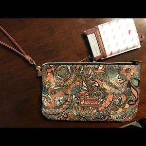 Sakroots wristlet w rechargable battery pack